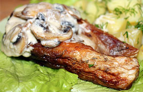 Белый амур с грибным соусом
