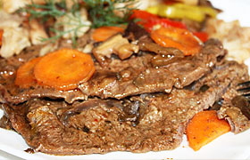 Говядина, запеченная с овощами в фольге